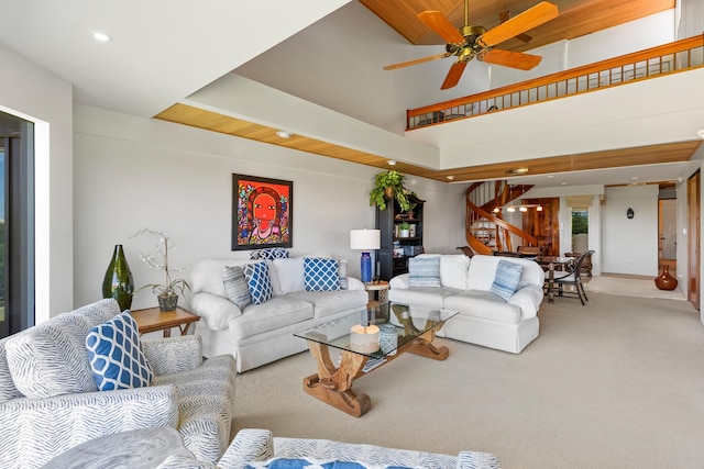 living room featuring carpet flooring and ceiling fan