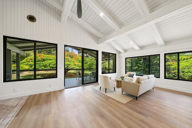 965 Hog Back Rd Unit 1, Haiku, HI 96708 - sunroom featuring healthy amount of natural light, wood finished floors, beam ceiling, and high vaulted ceiling