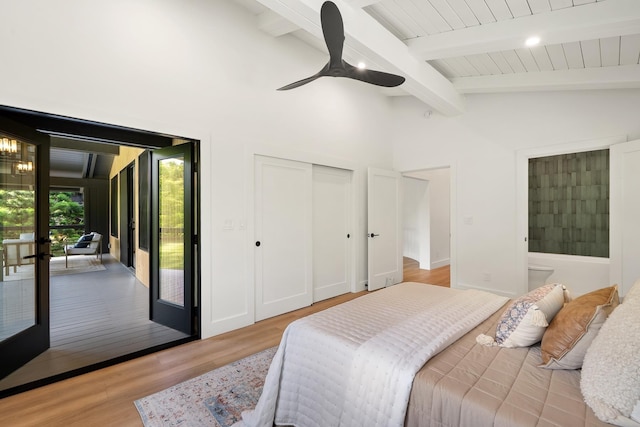 965 Hog Back Rd Unit 1, Haiku, HI 96708 - bedroom with access to exterior, light wood finished floors, ceiling fan, and a closet
