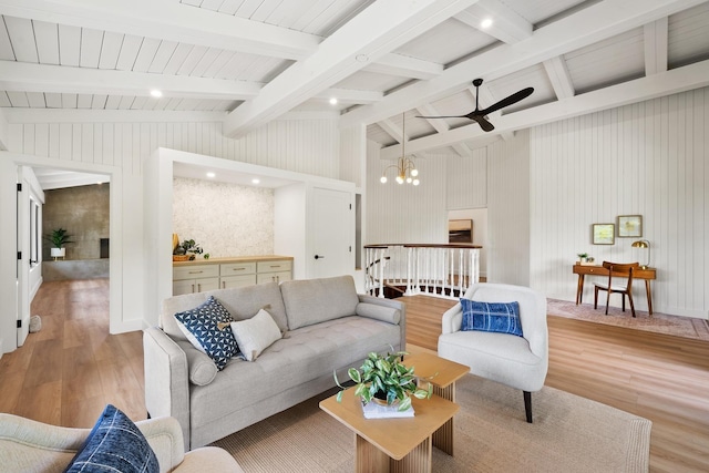 965 Hog Back Rd Unit 1, Haiku, HI 96708 - living room with light wood-style floors, ceiling fan, and a chandelier