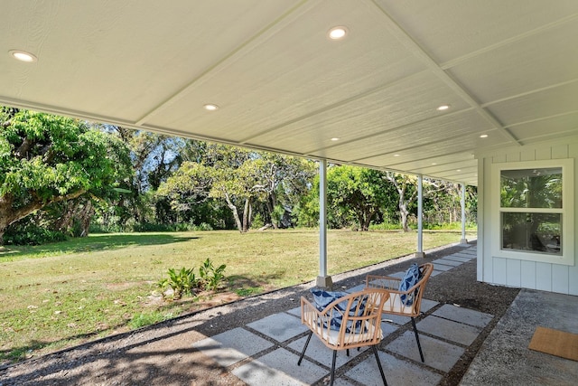 965 Hog Back Rd Unit 1, Haiku, HI 96708 - view of patio featuring view of wooded area