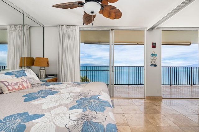 bedroom with ceiling fan, access to outside, and multiple windows