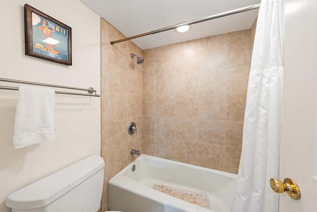 bathroom featuring toilet and shower / bathtub combination with curtain