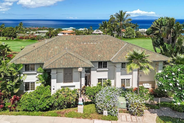 3950 Kalai Waa St Unit R 103, Kihei, HI 96753 - view of front of house with a tiled roof, stucco siding, and a water view