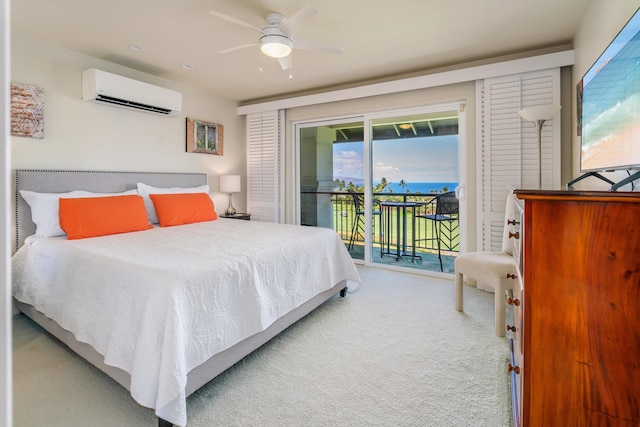 3950 Kalai Waa St Unit R 103, Kihei, HI 96753 - carpeted bedroom with a wall mounted air conditioner, access to outside, and a ceiling fan