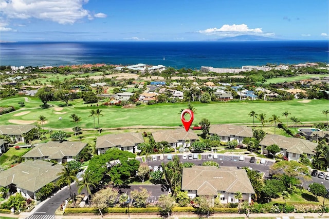 3950 Kalai Waa St Unit R 103, Kihei, HI 96753 - aerial perspective of suburban area featuring a large body of water and a local golf course