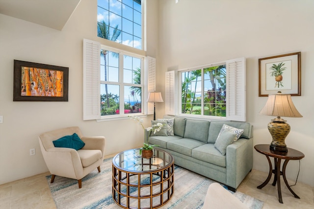 3950 Kalai Waa St Unit R 103, Kihei, HI 96753 - living room featuring a high ceiling and tile patterned flooring