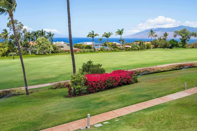3950 Kalai Waa St Unit R 103, Kihei, HI 96753 - view of property's community with a mountain view, a yard, and view of golf course