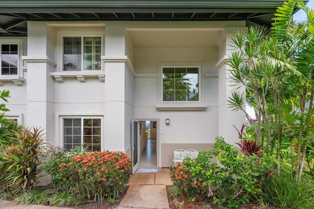 3950 Kalai Waa St Unit R 103, Kihei, HI 96753 - doorway to property featuring stucco siding