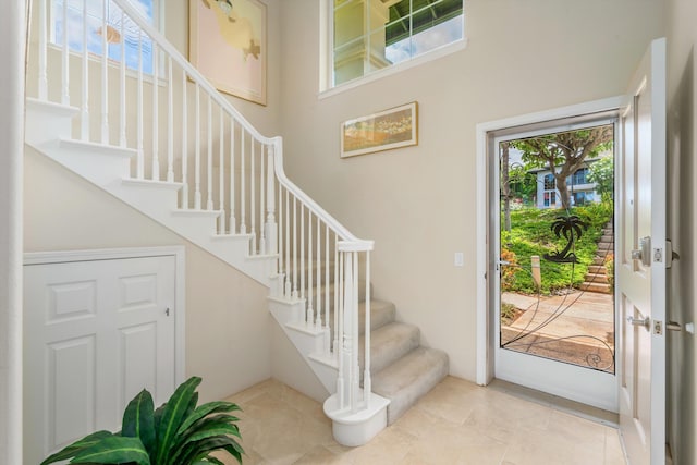 3950 Kalai Waa St Unit R 103, Kihei, HI 96753 - foyer entrance featuring stairway and a towering ceiling