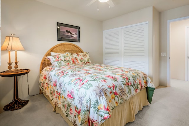 3950 Kalai Waa St Unit R 103, Kihei, HI 96753 - bedroom with light colored carpet, a closet, and a ceiling fan