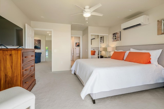 3950 Kalai Waa St Unit R 103, Kihei, HI 96753 - bedroom featuring a wall unit AC, attic access, light carpet, and ceiling fan