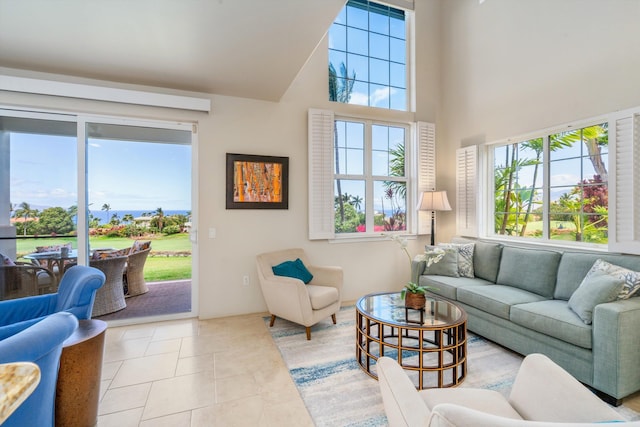 3950 Kalai Waa St Unit R 103, Kihei, HI 96753 - tiled living area featuring healthy amount of natural light and a high ceiling