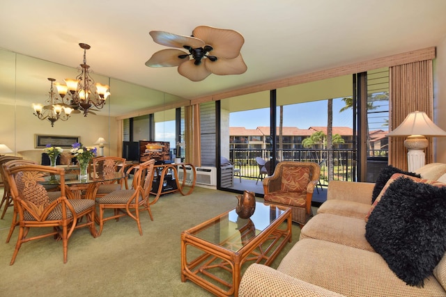 carpeted living room featuring ceiling fan with notable chandelier