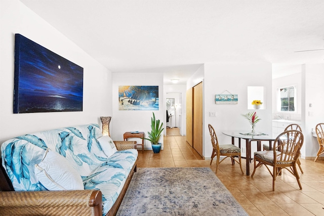 living room with light tile patterned floors