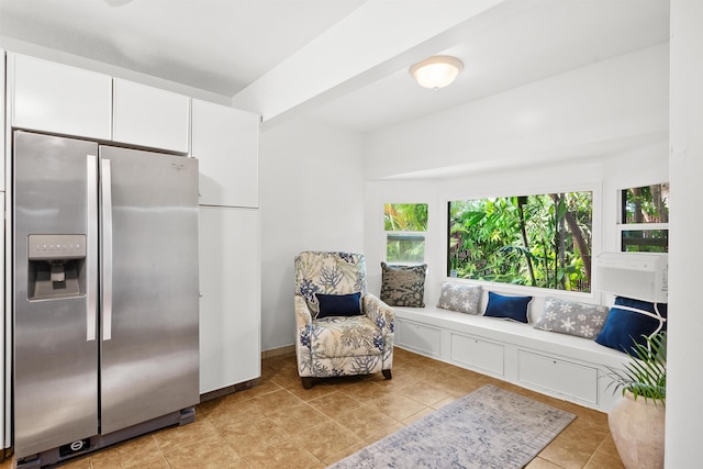 sitting room featuring light tile patterned floors