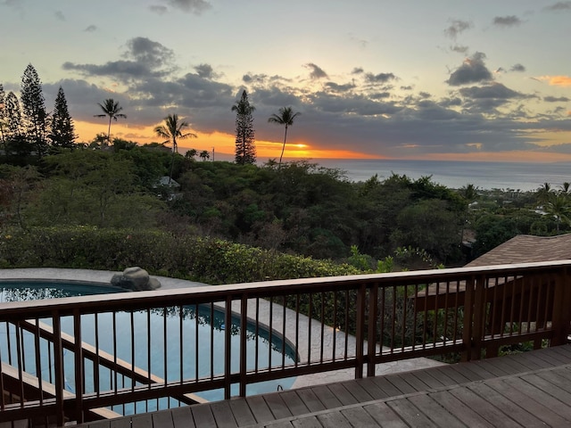 deck at dusk with a water view