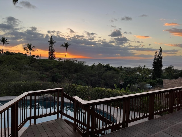 deck at dusk with a water view