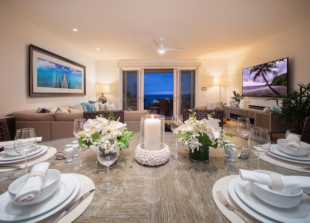 dining space featuring ceiling fan