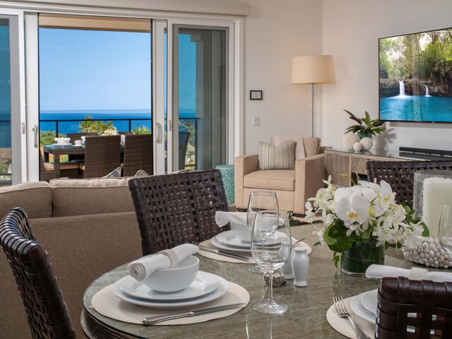 dining area with a water view