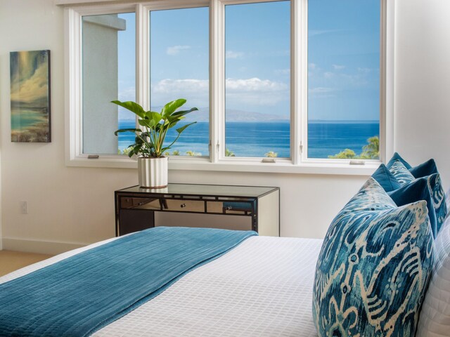 bedroom with a water view