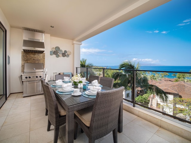 balcony featuring a water view and grilling area