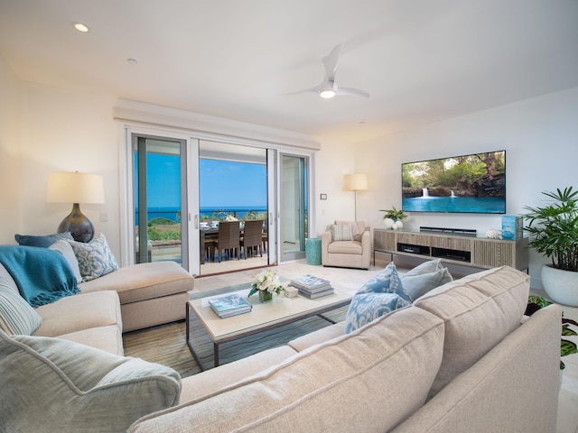 living room featuring ceiling fan