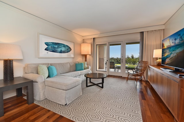 living room with ornamental molding and hardwood / wood-style flooring