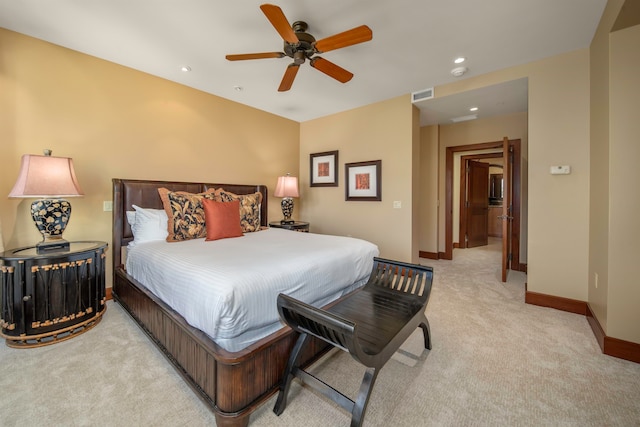 bedroom with light carpet and ceiling fan