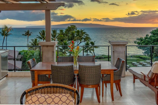 balcony at dusk with a water view