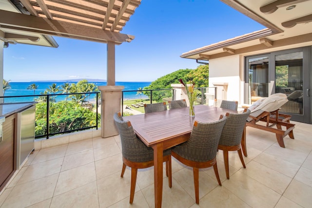 balcony featuring a water view