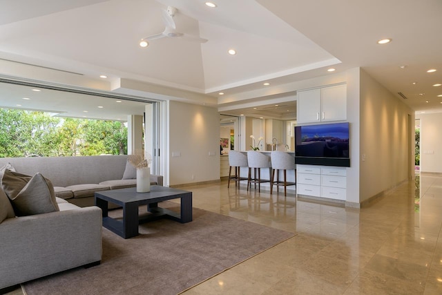 living room with ceiling fan