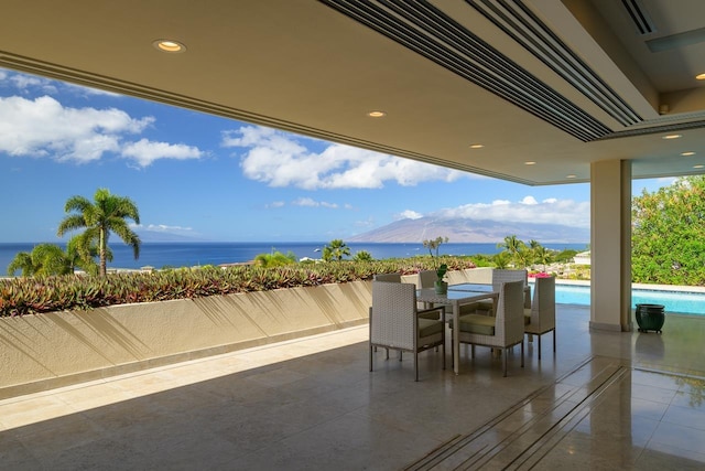 view of patio / terrace featuring a water view