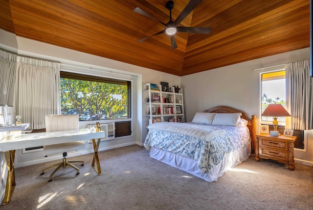 carpeted bedroom with ceiling fan, wooden ceiling, and high vaulted ceiling