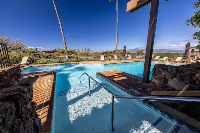 view of pool with a mountain view