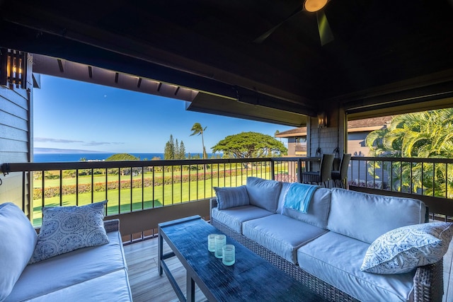 wooden deck featuring ceiling fan and an outdoor hangout area