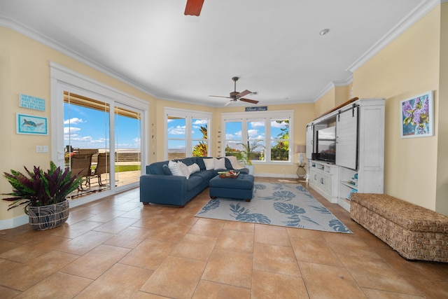 tiled living room with ceiling fan and crown molding