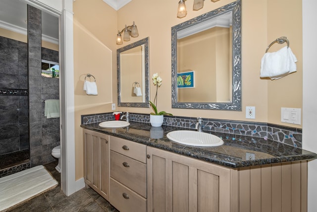 bathroom featuring tile patterned floors, vanity, toilet, and ornamental molding