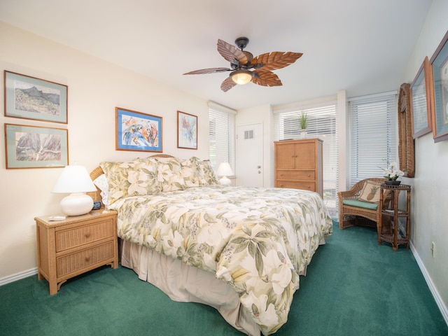 carpeted bedroom featuring ceiling fan