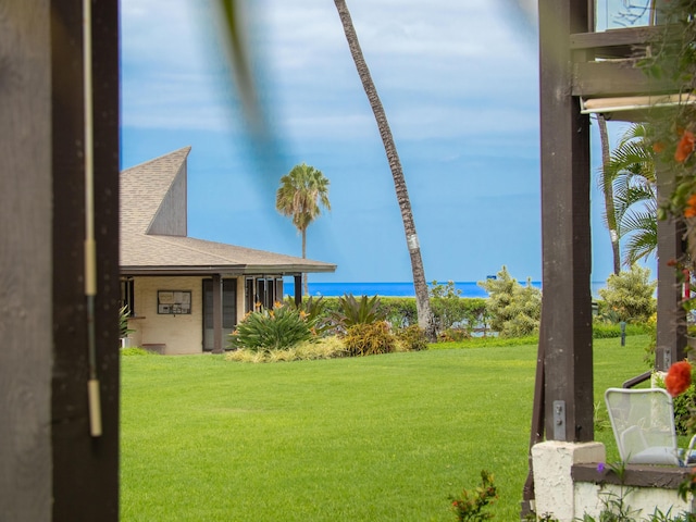 view of yard with a water view