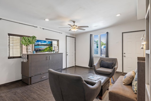 living area featuring recessed lighting, baseboards, ceiling fan, and dark wood-style flooring