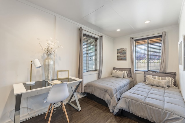 bedroom featuring recessed lighting and wood finished floors