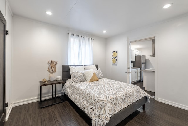 bedroom featuring recessed lighting, baseboards, and dark wood-style floors