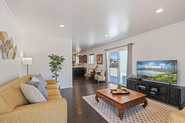 living area featuring recessed lighting, ornamental molding, and wood finished floors