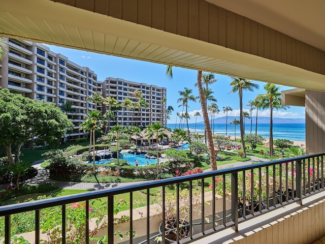 balcony featuring a water view