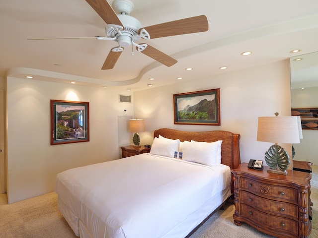 bedroom featuring ceiling fan and light colored carpet