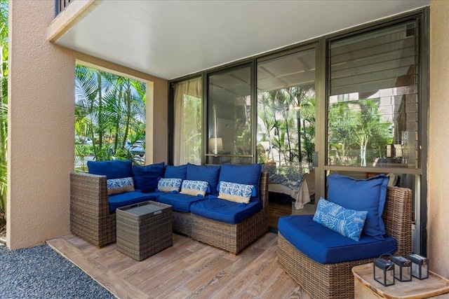 view of patio / terrace featuring an outdoor living space and a wooden deck