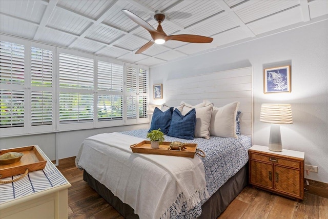 bedroom featuring wood-type flooring and ceiling fan