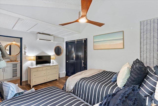 bedroom featuring ceiling fan, a wall mounted AC, dark hardwood / wood-style floors, and vaulted ceiling