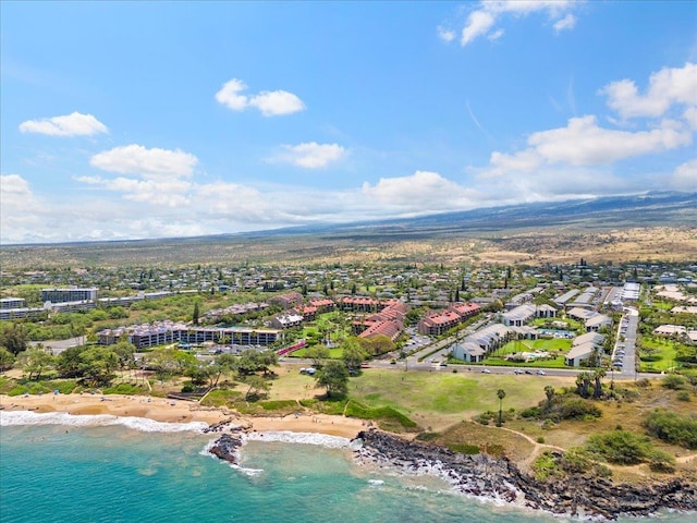 bird's eye view with a beach view and a water view